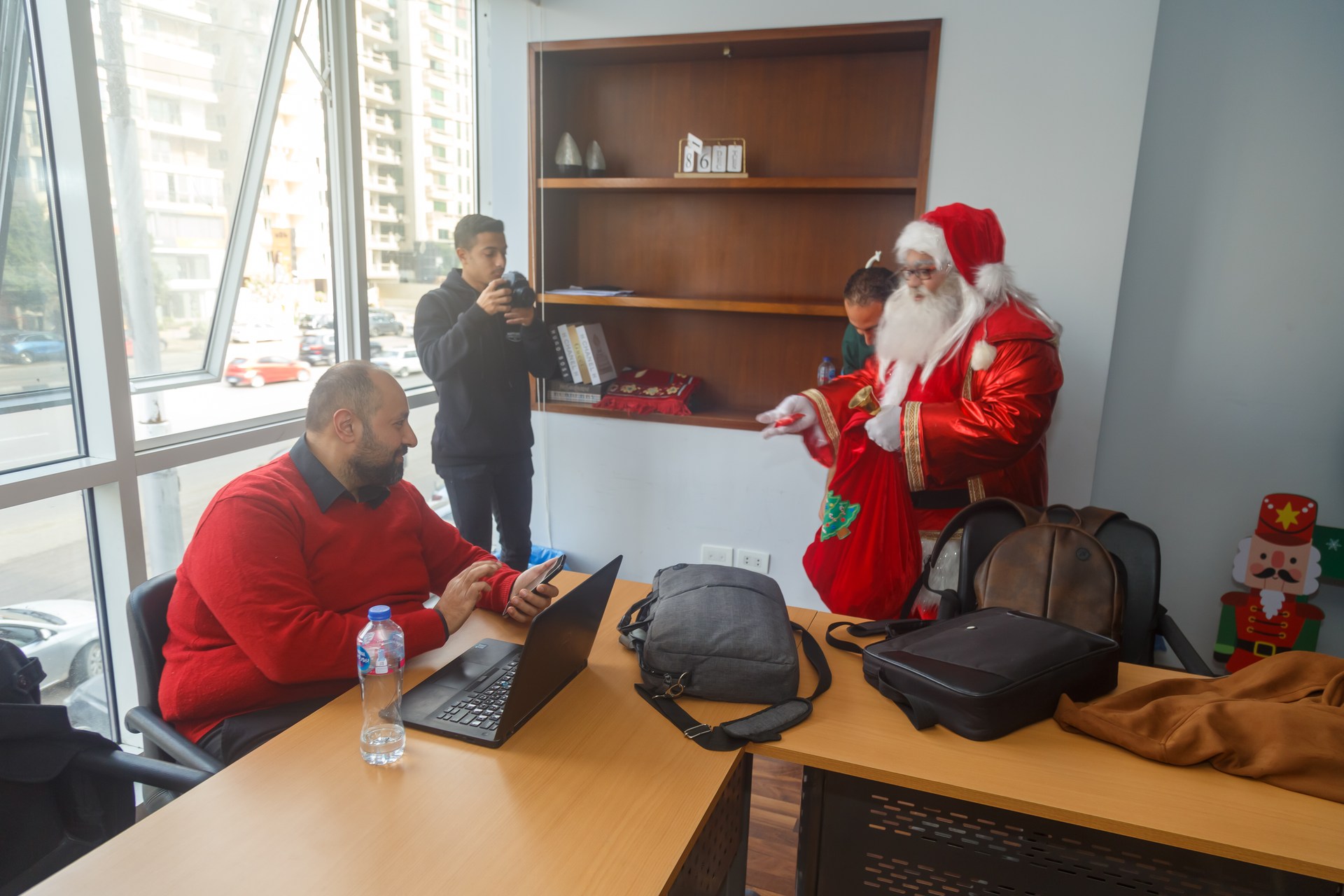 Santa joining the ATRIC team in the office