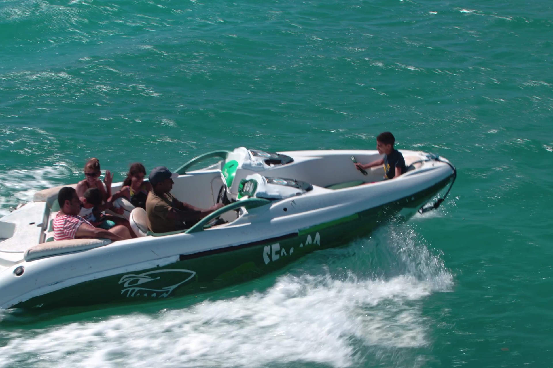 A family heading onto the Red Sea by speedboat at BOHO Sokhna