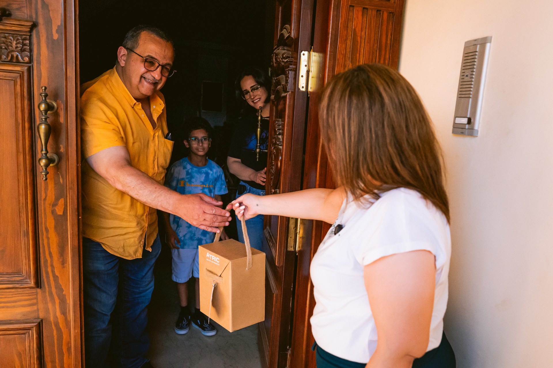 ATRIC delivering an Eid gift to residents at Divina Gardens