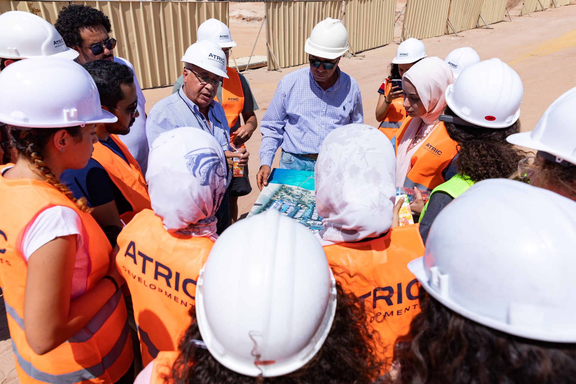 GUC students reviewing plans during the guided site visit